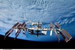 Вид на Международную космическую станцию с шаттла Дискавери после расстыковки